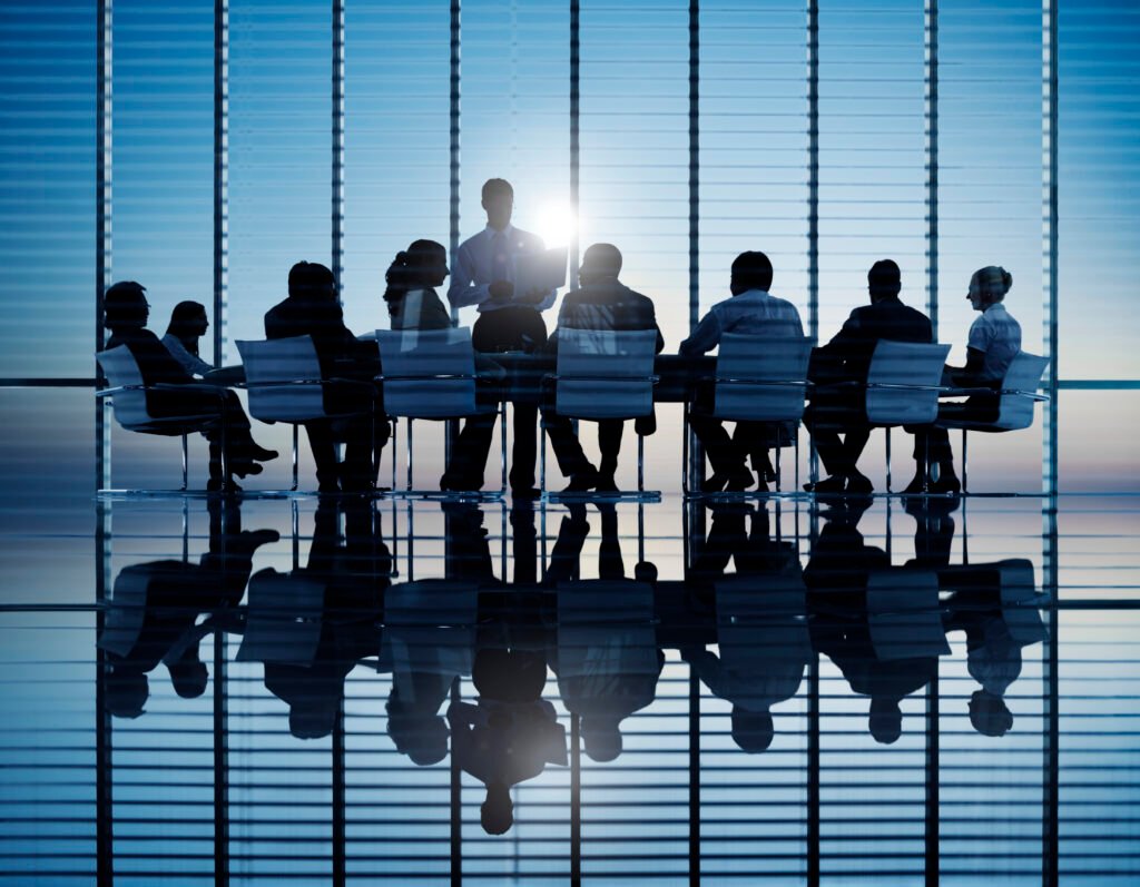 business people in a board room meeting