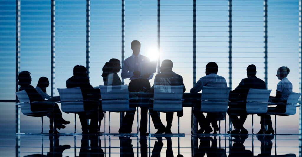 business people in a board room meeting
